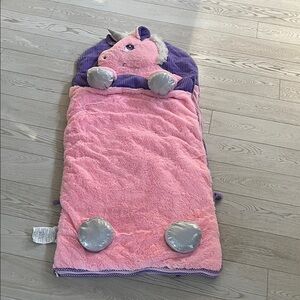Super cute and cuddly unicorn sleeping bag.